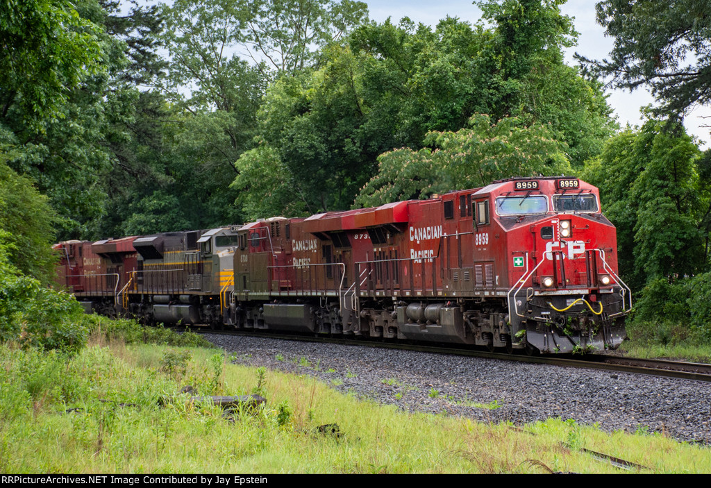 A northbound intermodal rolls around the bend at County Road 13